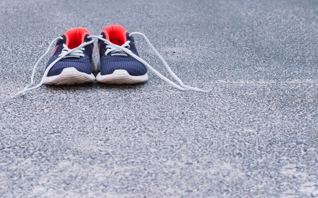 Sneakers on asphalt