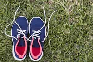 Free photo sneakers on grass