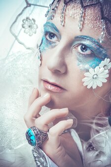 Snow queen over white background