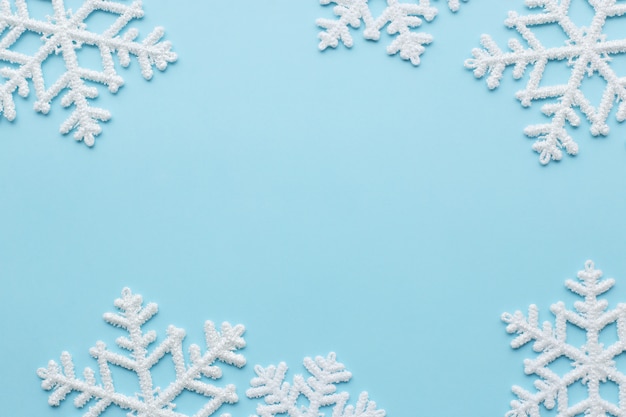 Snowflakes on blue surface