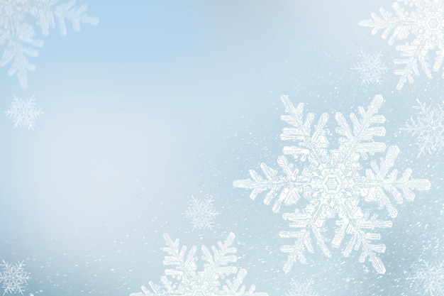 Snowflakes on blue winter background