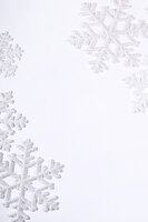 Free photo snowflakes on white surface
