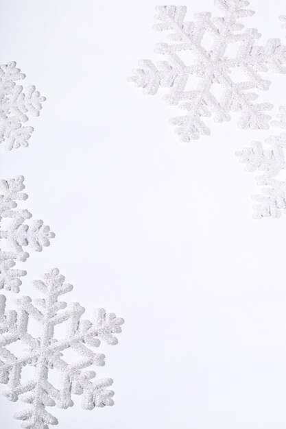 Snowflakes on white surface