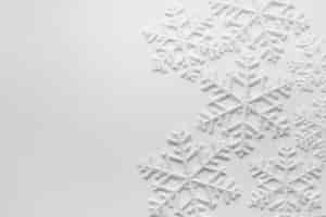 Free photo snowflakes on white surface