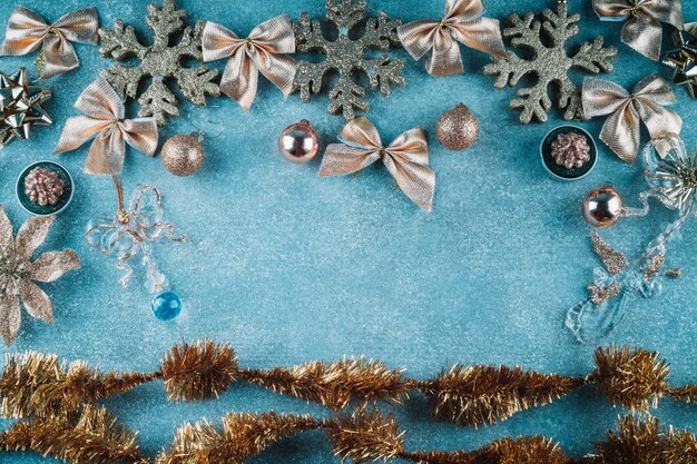 Snowflakes with bows on blue background 