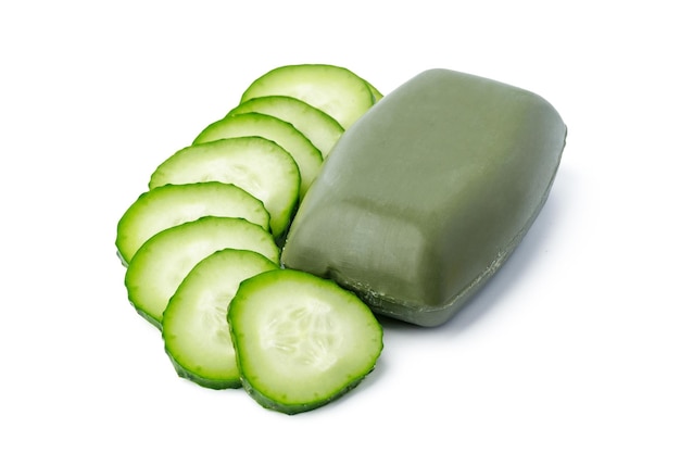 Free photo soap bar with cucumber slices on white background