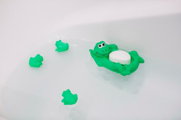 Soap and toys in bathtub