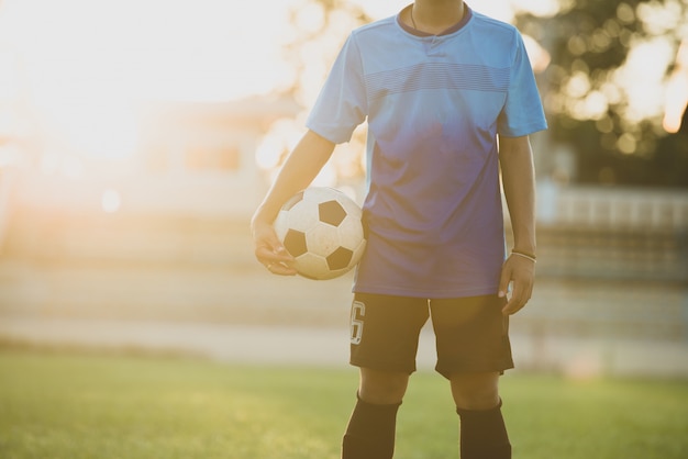 Free photo soccer player action on the stadium