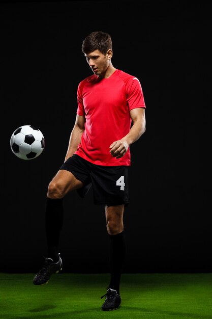 Soccer player kicking ball