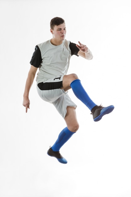 Free photo soccer player warming up