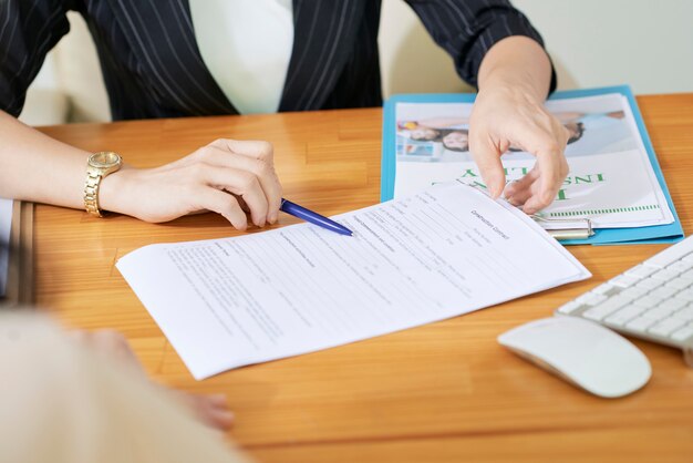 Social worker explaining documents