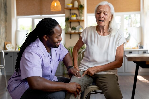 Social worker helping a senior woman