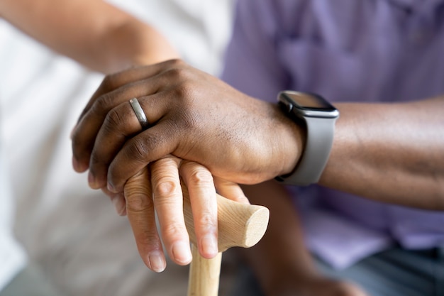 Social worker taking care of an old woman