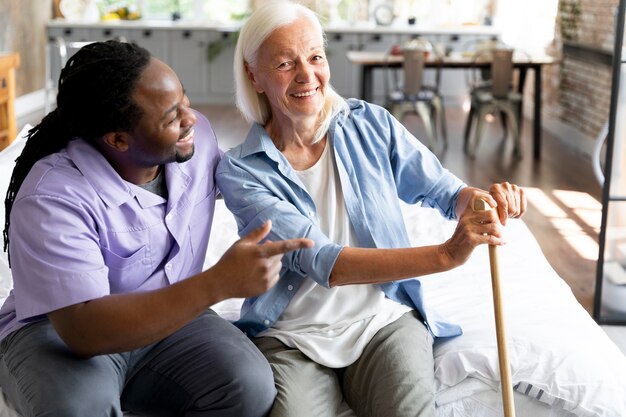 Social worker taking care of a senior woman