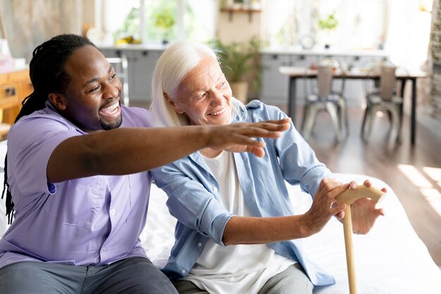 Social worker taking care of a senior woman