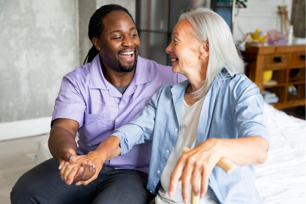 Social worker taking care of a senior woman