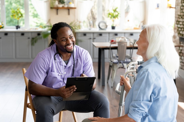Free Photo social worker taking care of a senior woman