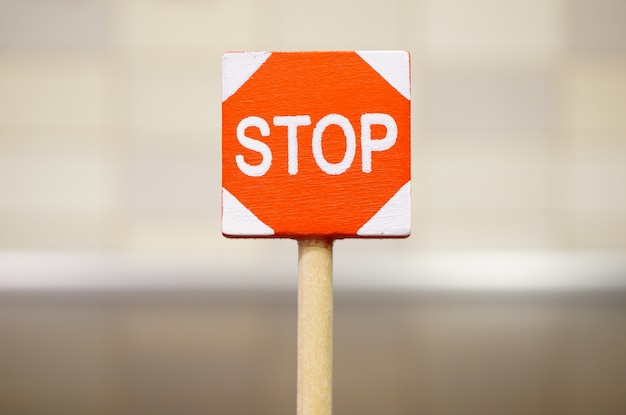 Soft focus shot of a stop sign on the road