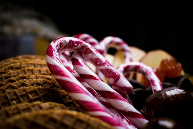 Free photo soft focus of wafers and candy canes on display