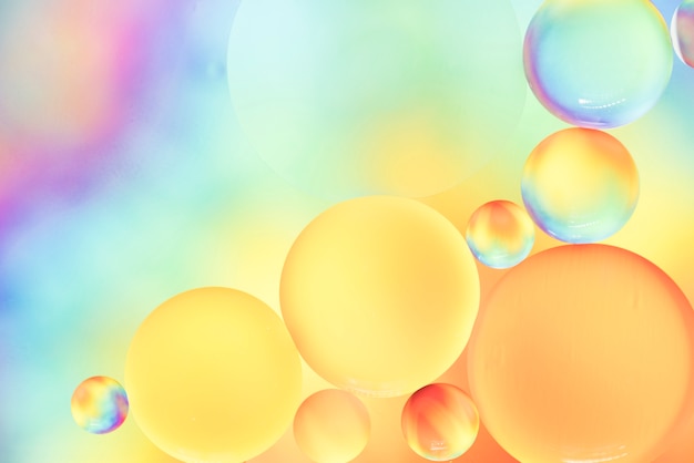 Soft rainbow bubbly abstract background