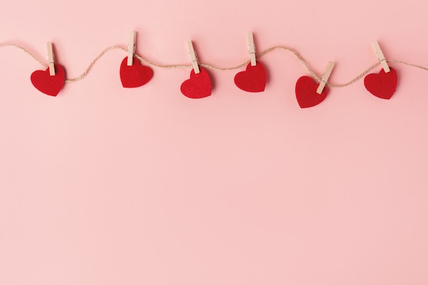 Soft valentines day hearts on pink