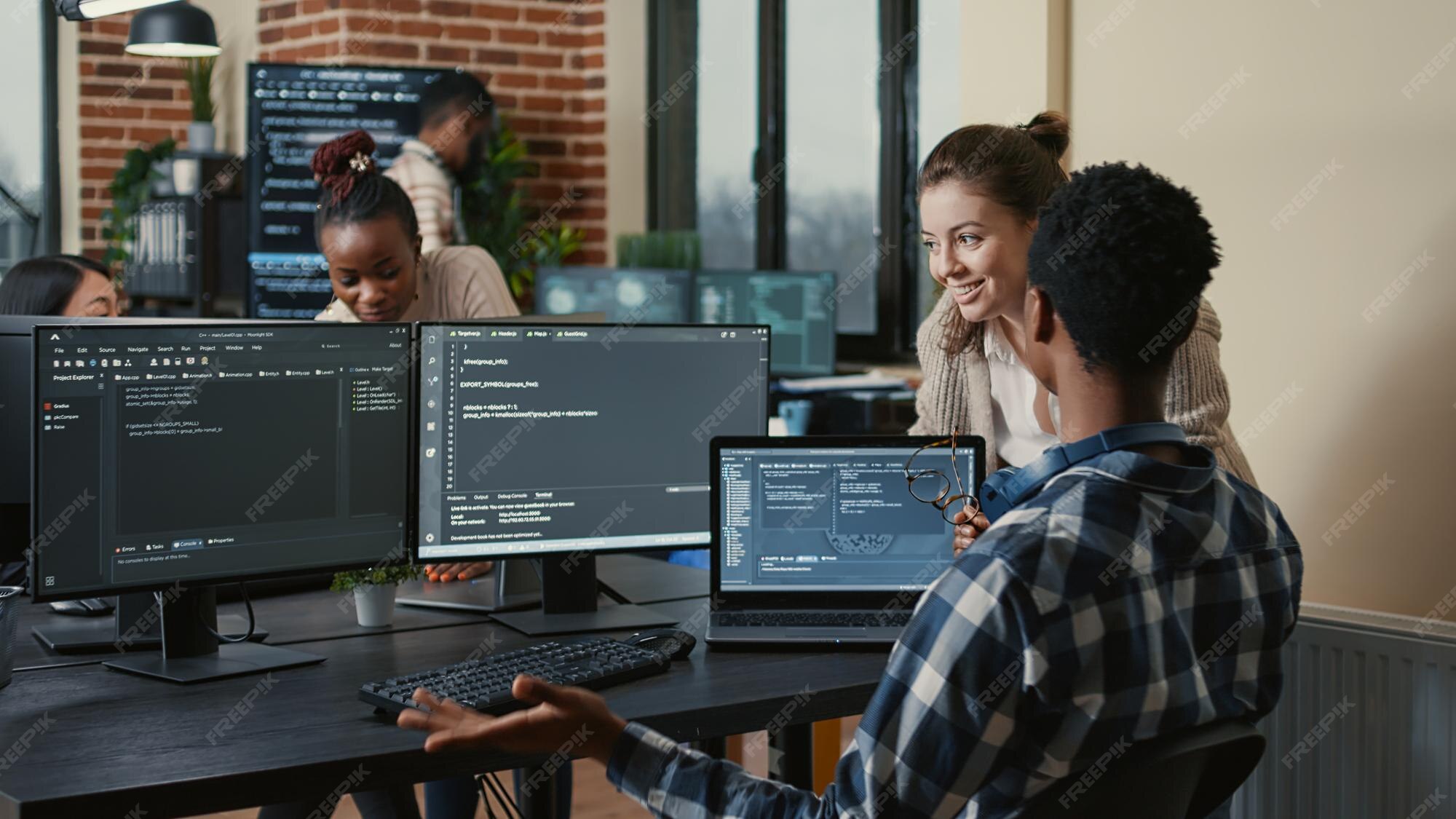 Premium Photo | Software developers celebrating successful code ...