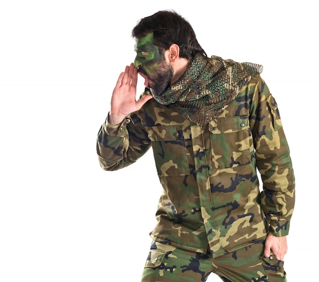 Soldier shouting over white background