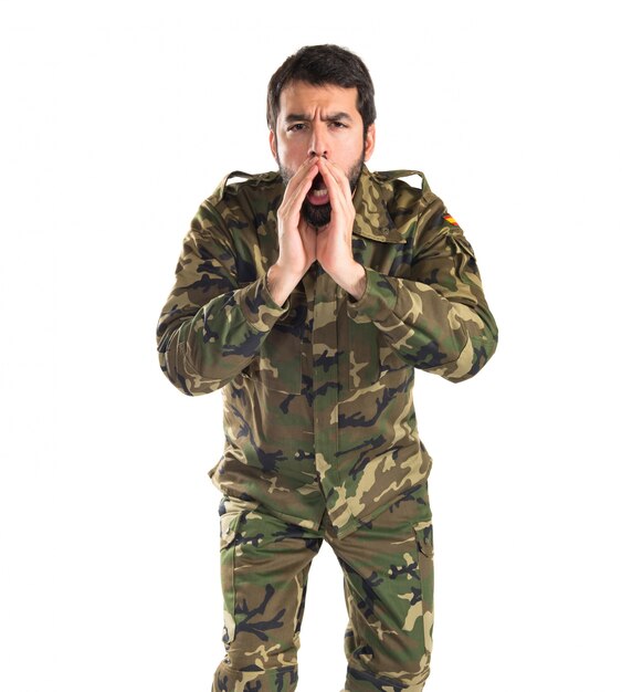 Soldier shouting over white background