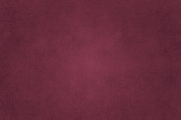 Free photo solid maroon concrete textured wall