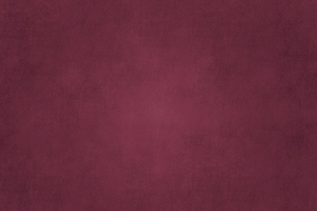 Solid maroon concrete textured wall