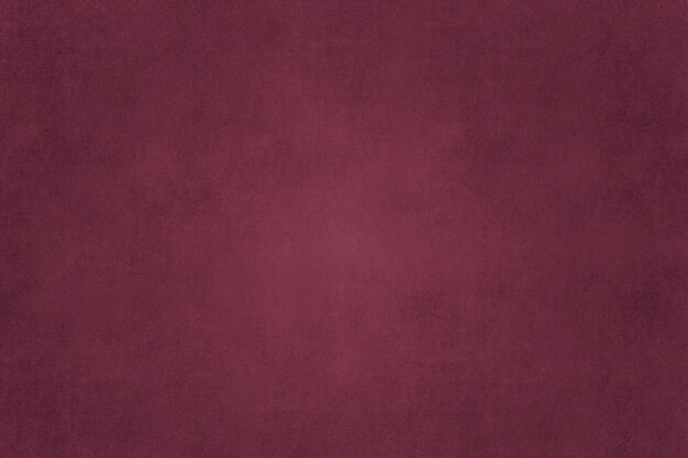 Solid maroon concrete textured wall