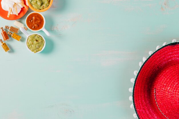 Free photo sombrero and sauces composition