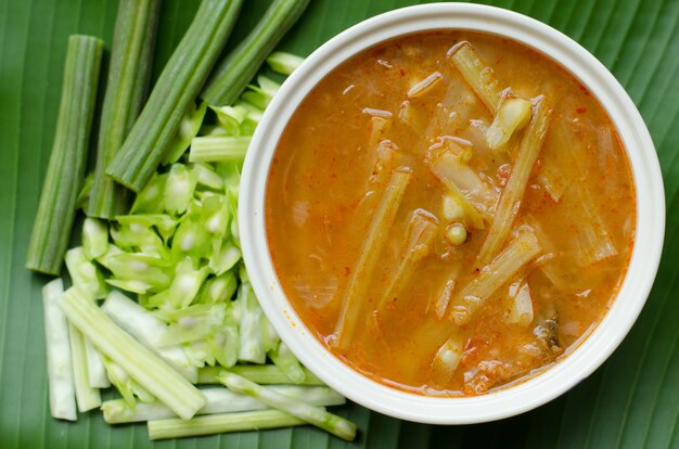 Sour soup with fish and moringa