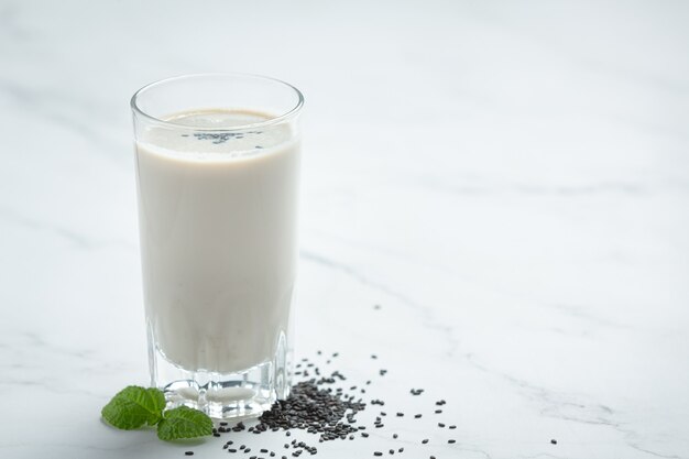 Soy milk mix black sesame on marble background