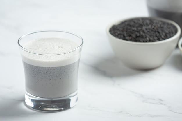 Soy milk mix black sesame on marble background