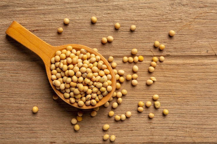 Free Photo soybean seeds on wooden floor and hemp sacks food nutrition concept.
