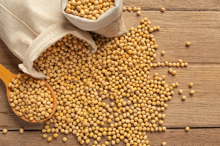 Free Photo soybean seeds on wooden floor and hemp sacks food nutrition concept.