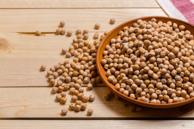 Soybeans over wooden table background