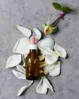 Free photo spa composition for healthy lifestyle oil over petals