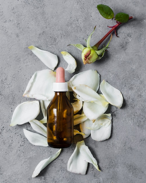 Spa composition for healthy lifestyle oil over petals