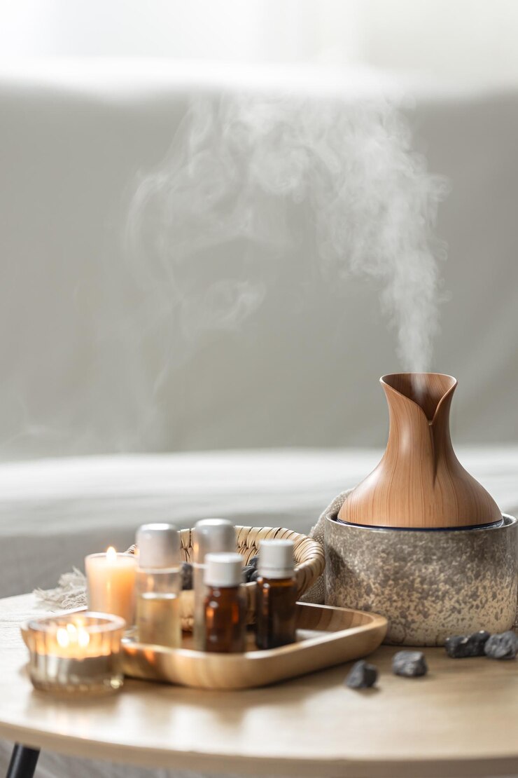 Free Photo spa composition with air humidifier and aroma oils