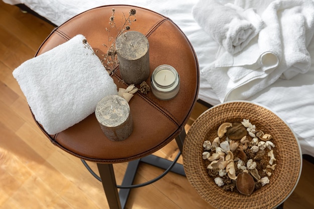 Spa composition with candles and towel top view