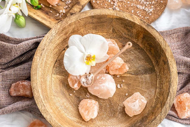 Free photo spa composition with sea salt and orchid flowers