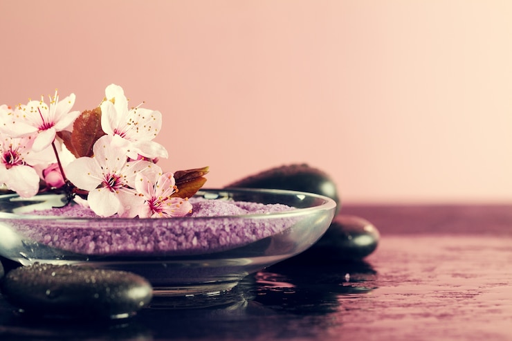 Free Photo spa concept. closeup of beautiful spa products - spa salt and flowers. horizontal.