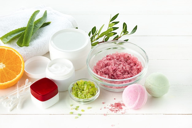 Spa concept with salt, mint, lotion, towel