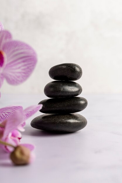 Spa concept with stones and flowers