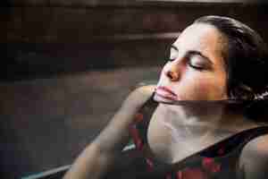 Free photo spa concept with woman relaxing in water