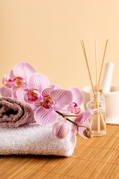 Spa decoration with scented sticks and flowers