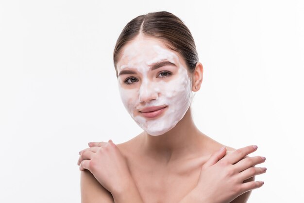 spa girl applying facial mask. beauty treatments. cosmetics