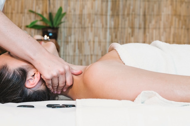 Spa and massage concept with relaxed woman